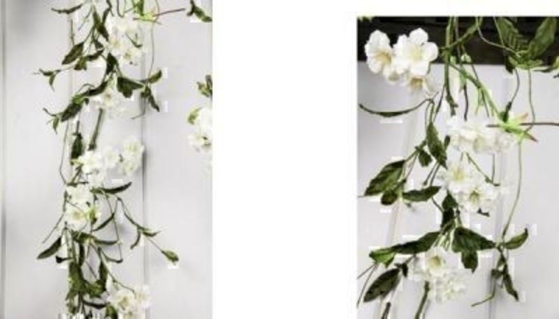 Artificial Cherry Blossom Garland by Bloomsberry Artificial Cherry Blossom Garland by Bloomsberry.This stunning silk Cherry Blossom garland looks as realistic as possible for artificial flowers and the lifelike movement mimics that of their natural counterpart. For realistic fake and silk flowers Blooms